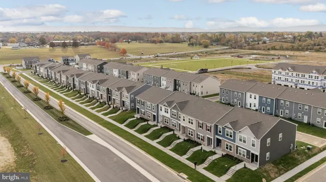 a view of a city with an ocean view