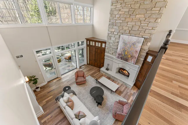 a large kitchen with stainless steel appliances granite countertop a sink counter space and a stove