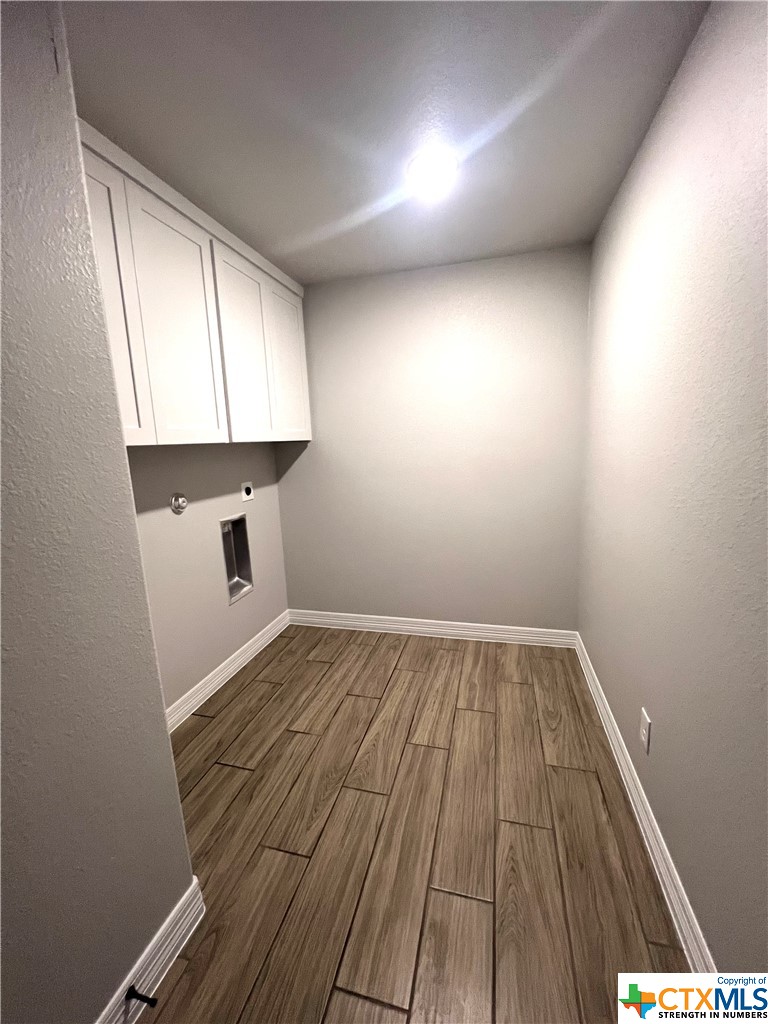 3827 Leming Court Temple, TX 76504 - Photo 13 of 14 a view of empty room with wooden floor and fan