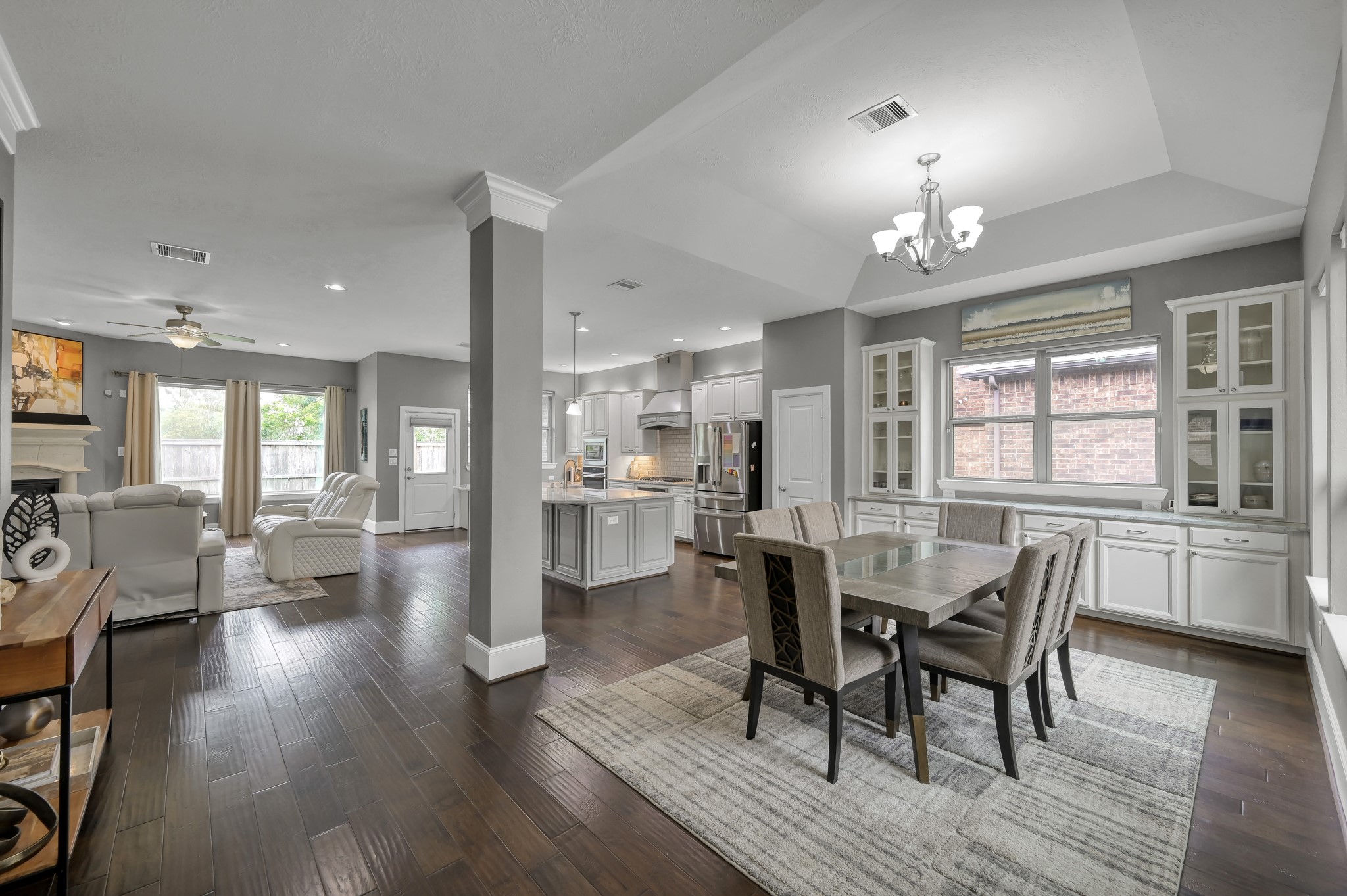 31714 Pierwood Court Spring, TX 77386 - Photo 11 of 49 a view of a dining room with furniture window and wooden floor
