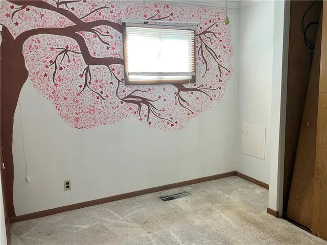 a view of a hallway with entryway