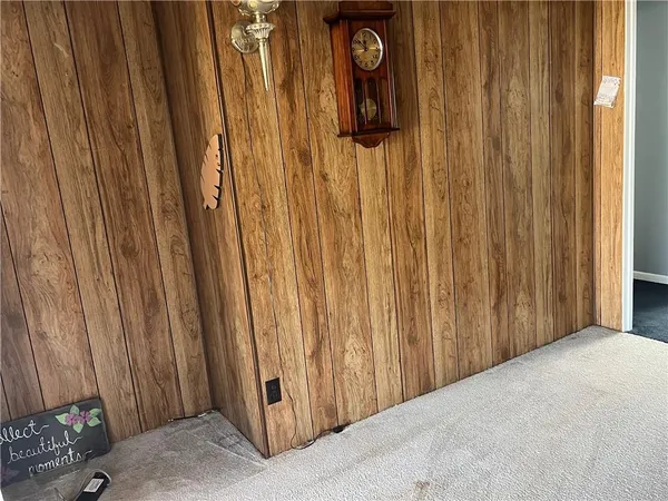 a view of a utility room with a door