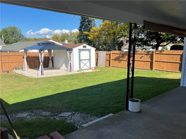 a view of a garden with an outdoor space