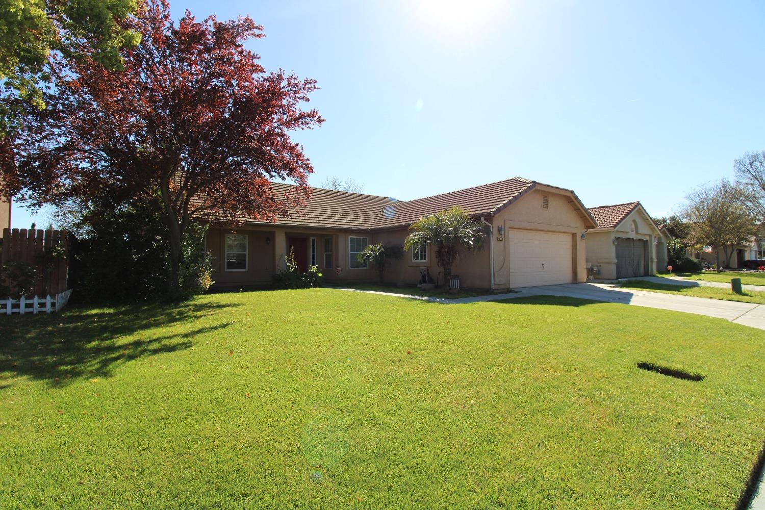 554 St Michelle Drive Madera, CA 93637 - Photo 2 of 19 a house view with swimming pool in front of it