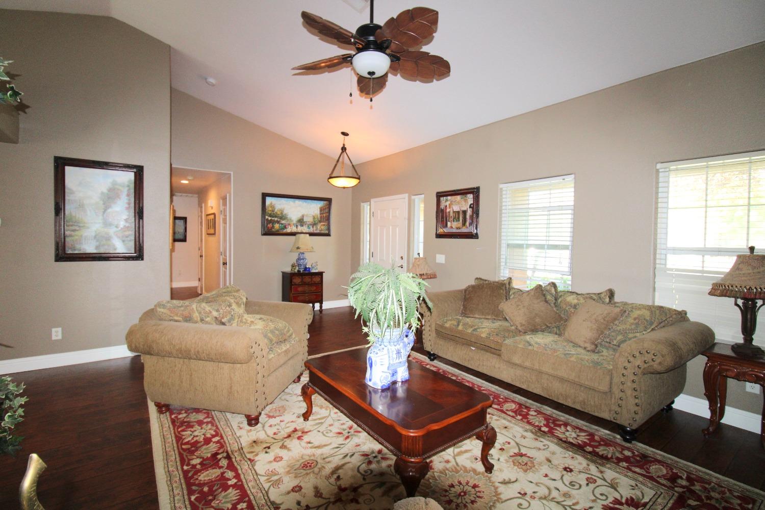 554 St Michelle Drive Madera, CA 93637 - Photo 5 of 19 a living room with furniture and a wooden floor