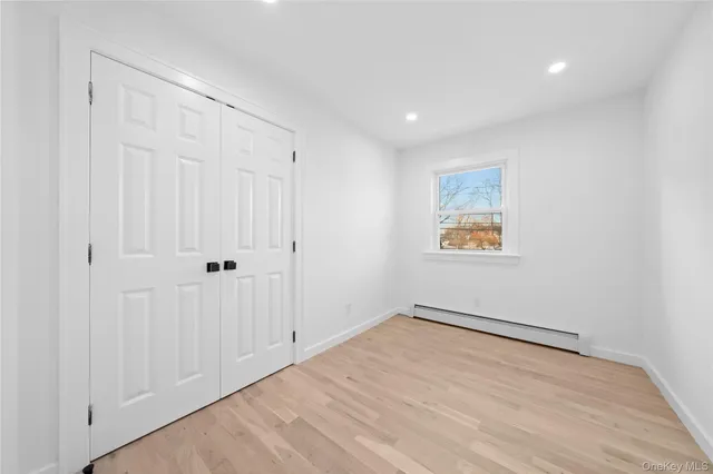 a kitchen with stainless steel appliances a refrigerator and a stove top oven