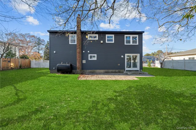 an empty room with a empty space and windows