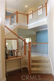 45344 St Tisbury Street Temecula, CA 92592 - Photo 4 of 28 a view of entryway a hall with wooden floor and front door