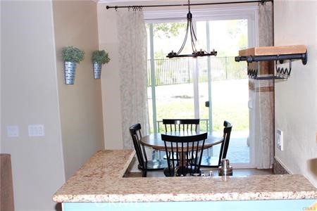 45344 St Tisbury Street Temecula, CA 92592 - Photo 6 of 28 a view of a dining room with furniture