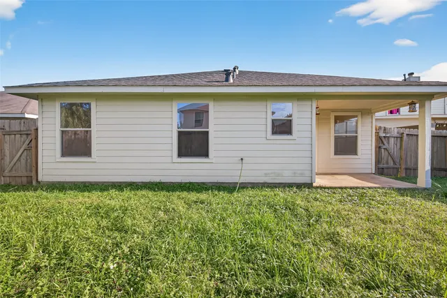 a view of a backyard with a garden