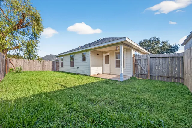 a view of a backyard with plants