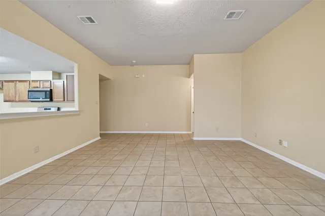 a large kitchen with cabinets