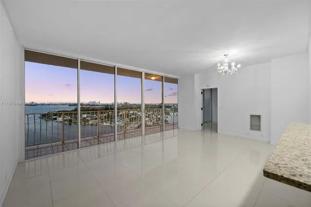 a view of an empty room with a sliding door