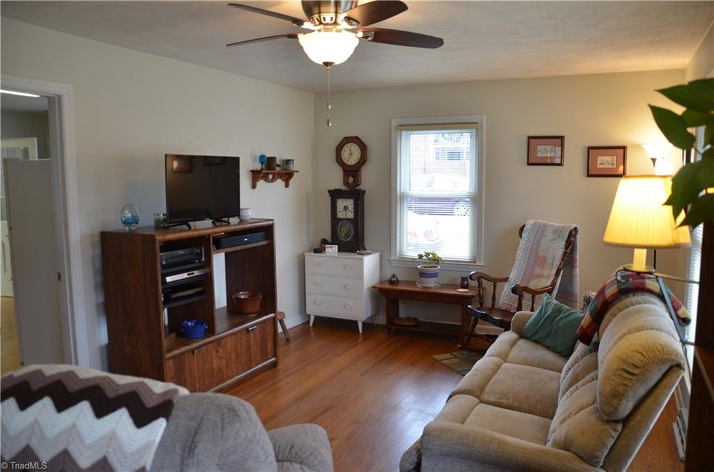 1631 Larkin Street High Point, NC 27262 - Photo 2 of 17 Living room has hardwood floors and is light and bright.