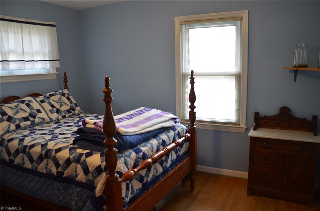 1631 Larkin Street High Point, NC 27262 - Photo 4 of 17 Spacious Second Bedroom with Hardwood Flooring
