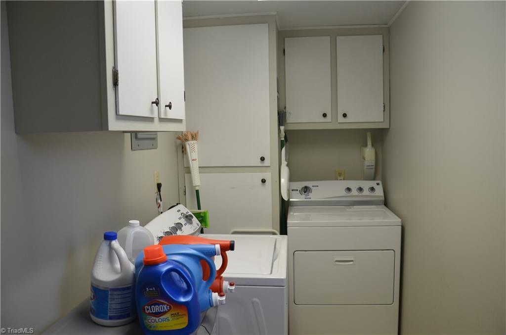 1631 Larkin Street High Point, NC 27262 - Photo 8 of 17 Laundry/Mud Room with Cabinets & an exterior door.