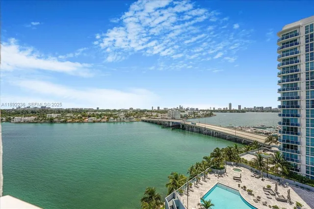 a view of a lake from a city