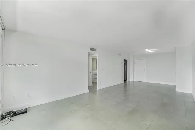 an empty room with an entryway