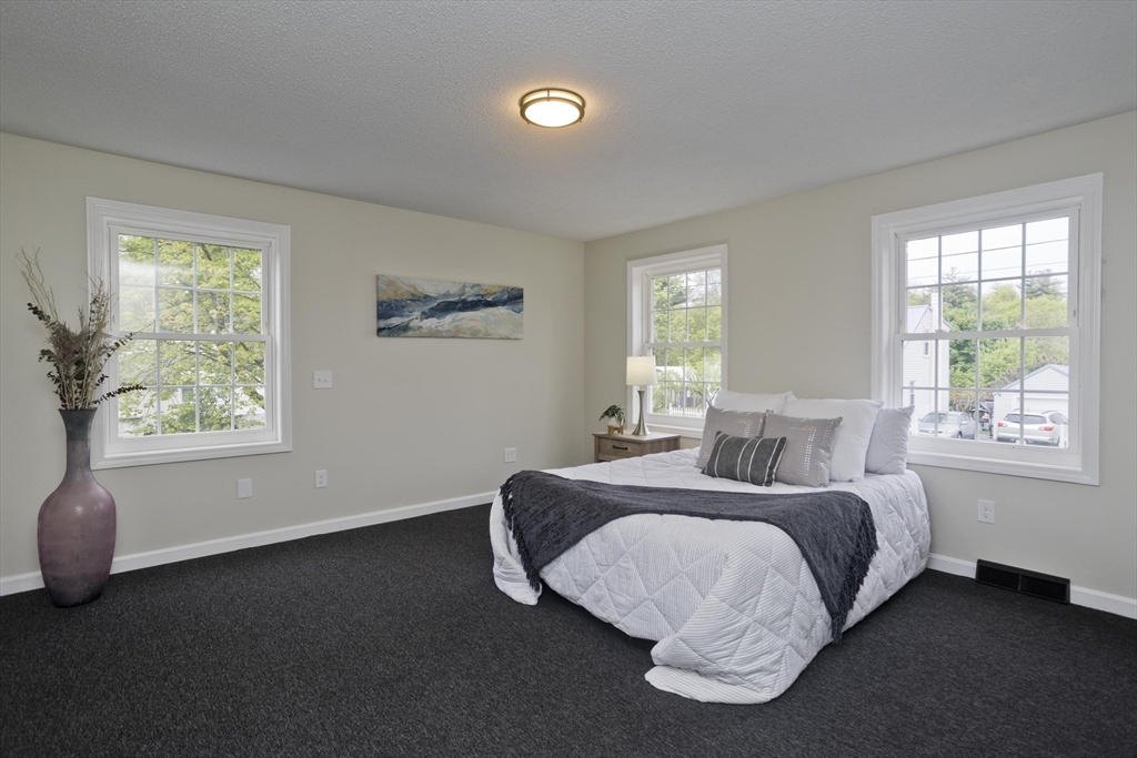 2089 Oak Street Three Rivers, MA 01080 - Photo 11 of 42 a bedroom with a bed and a window