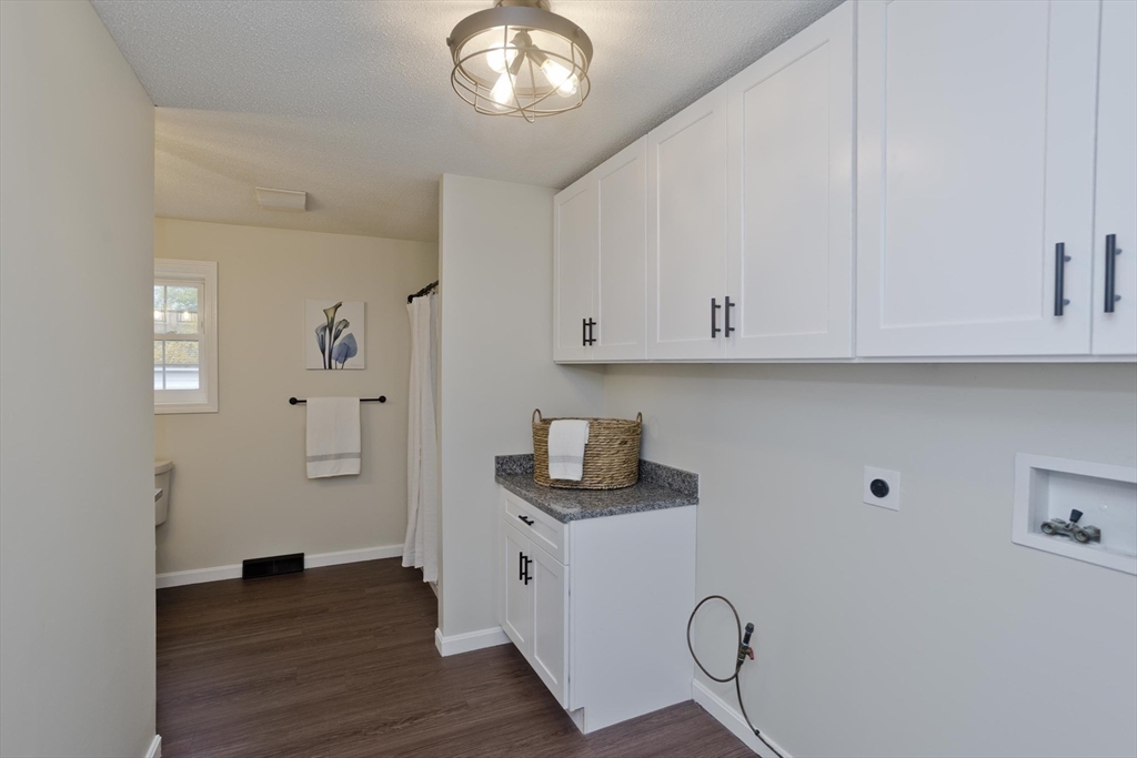 2089 Oak Street Three Rivers, MA 01080 - Photo 20 of 42 a view of cabinets and wooden floor