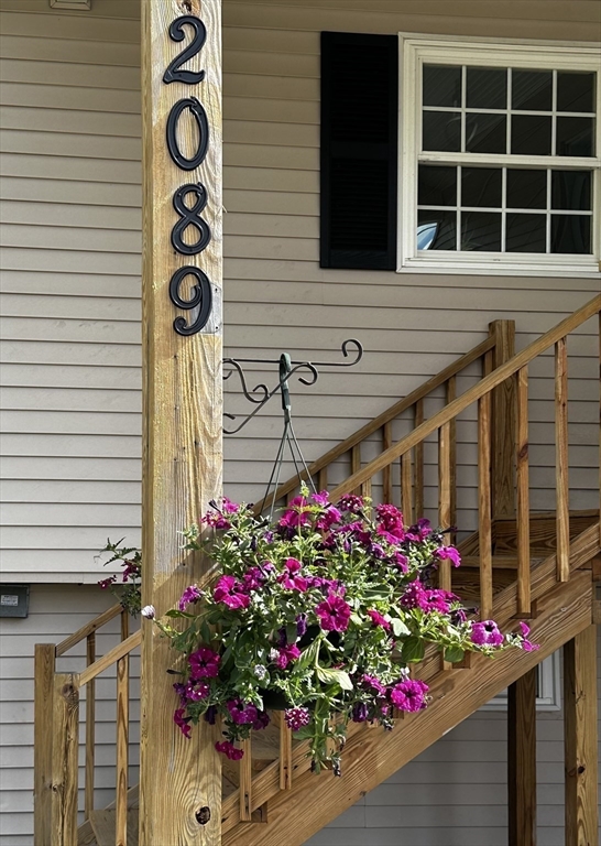 2089 Oak Street Three Rivers, MA 01080 - Photo 2 of 42 a flower vase sitting in front of a house