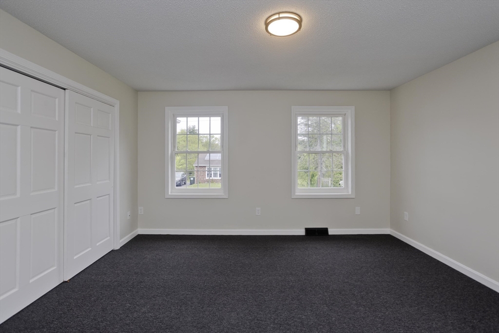 2089 Oak Street Three Rivers, MA 01080 - Photo 23 of 42 an empty room with windows