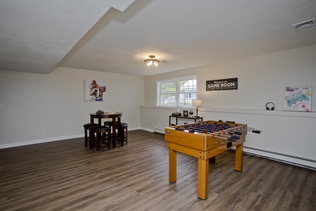 2089 Oak Street Three Rivers, MA 01080 - Photo 30 of 42 a living room with furniture and wooden floor
