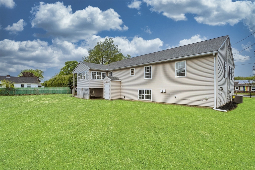 2089 Oak Street Three Rivers, MA 01080 - Photo 3 of 42 a front view of house with yard and trees