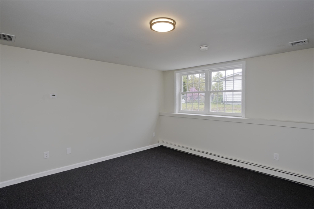 2089 Oak Street Three Rivers, MA 01080 - Photo 31 of 42 an empty room with a window