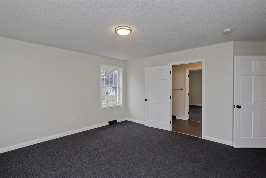 2089 Oak Street Three Rivers, MA 01080 - Photo 32 of 42 a view of an empty room and closet area