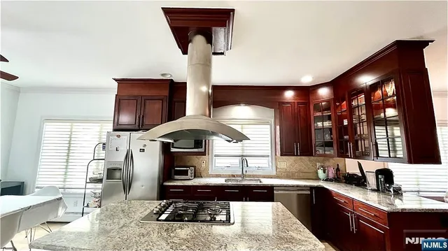 a bathroom with a toilet a sink and a mirror