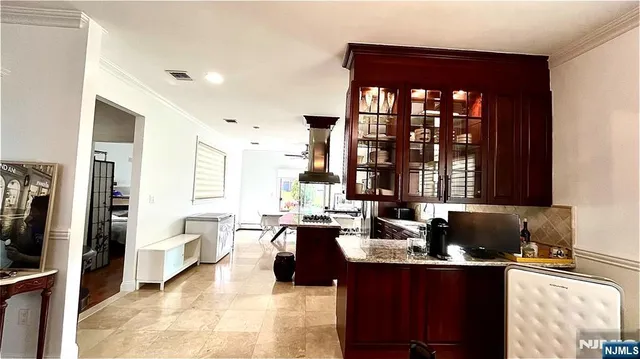 a bedroom with a bed and a fireplace