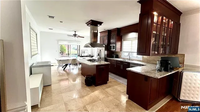 a living room with furniture fireplace and flat screen tv