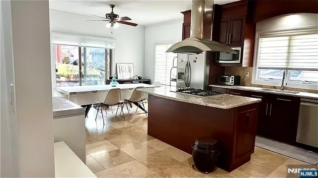 a bathroom with a bathtub and a window