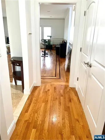 a bathroom with a granite countertop toilet a sink and a shower