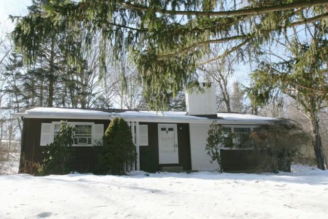 24 Quaker Ridge Road Shelton, CT 06484 - Photo 1 of 1 a front view of a house with a yard