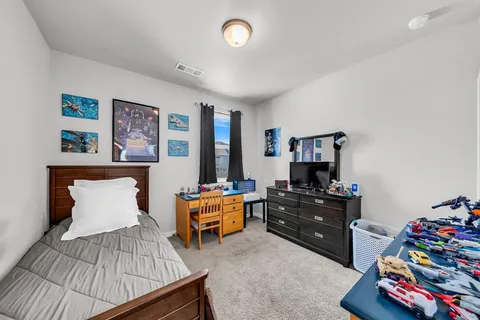 a kitchen with stainless steel appliances granite countertop a stove a microwave and cabinets