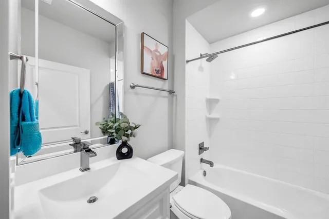 a bedroom with bed and furniture