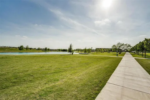 a view of a dining room with many windows