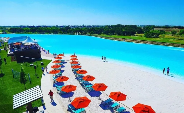 a view of a balcony with floor to ceiling windows