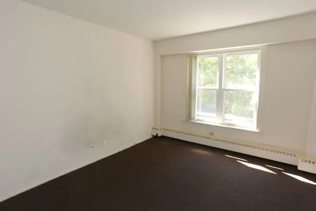 an empty room with a window