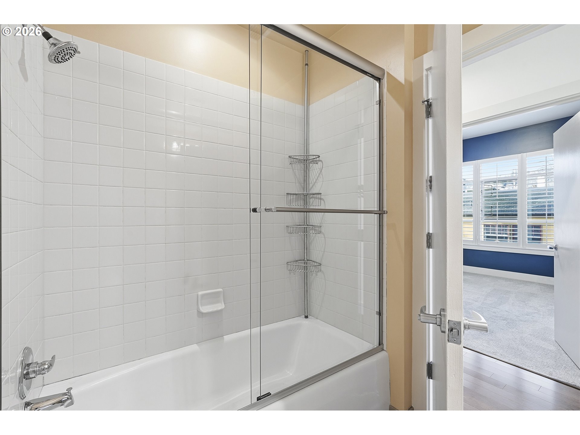 1930 Northwest Irving Street, Unit 302 Portland, OR 97209 - Photo 13 of 26 a bathroom with a glass shower door