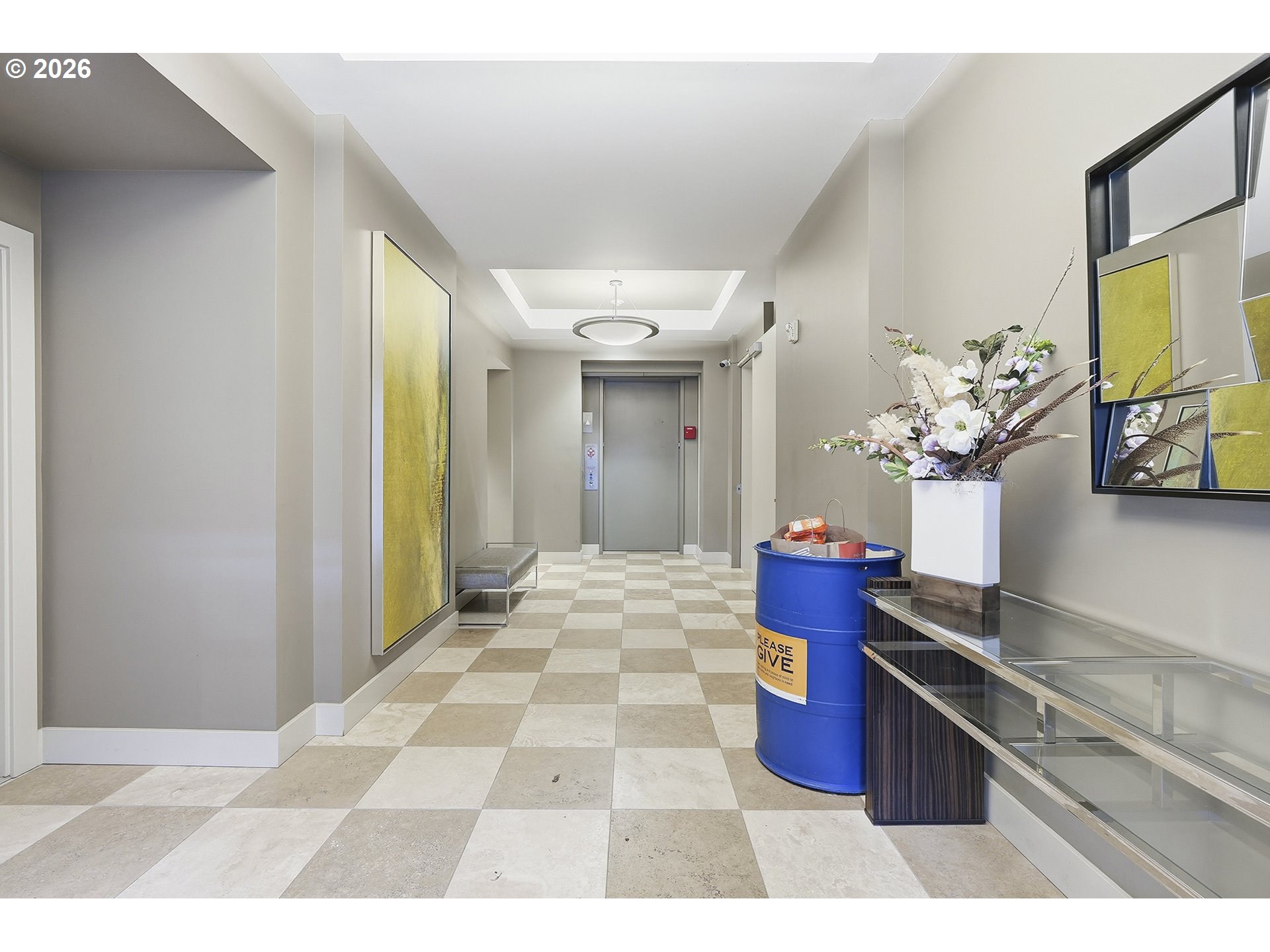 1930 Northwest Irving Street, Unit 302 Portland, OR 97209 - Photo 24 of 26 a kitchen with a sink cabinets and stainless steel appliances