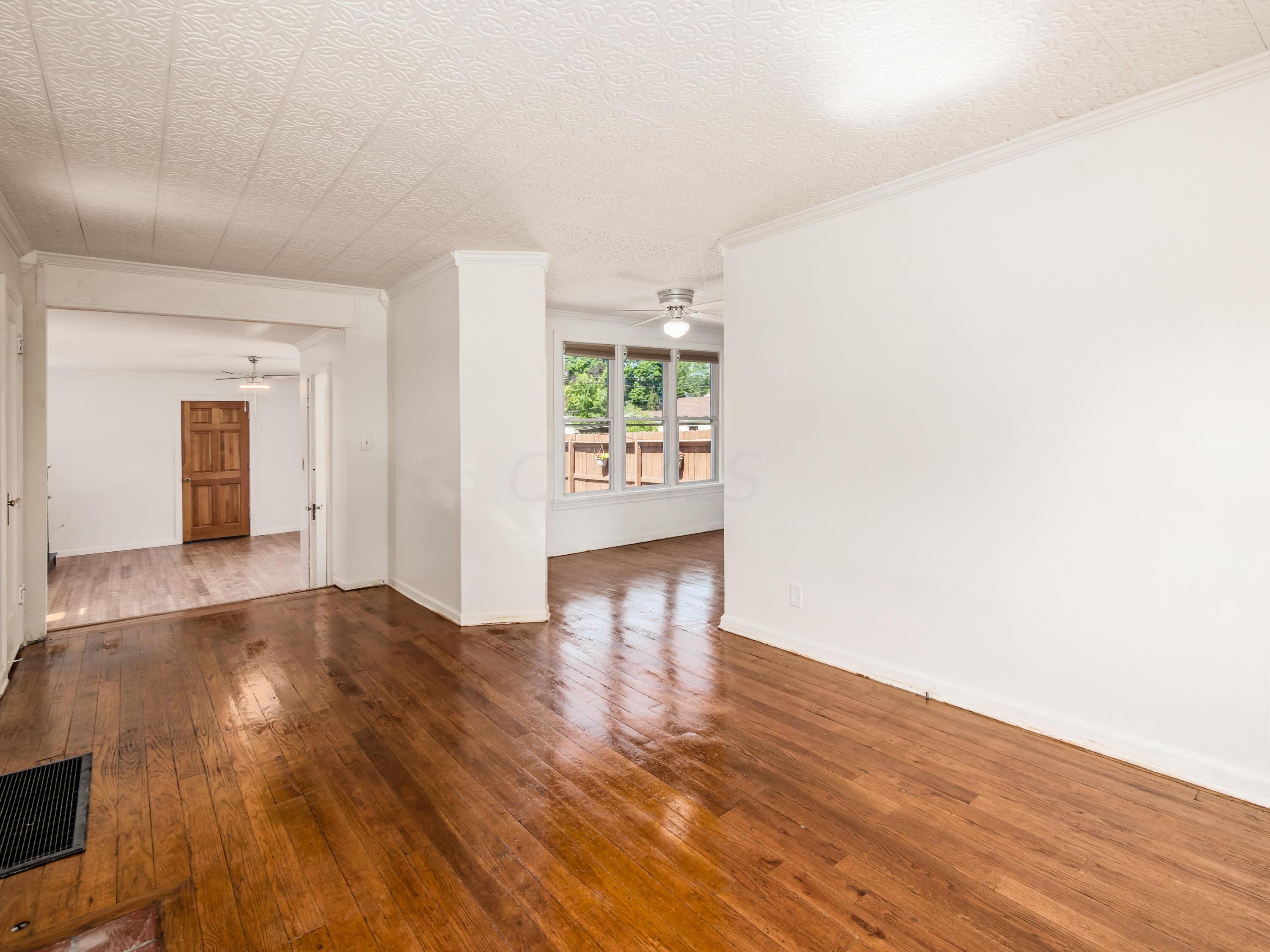 3032 Wicklow Road Columbus, OH 43204 - Photo 8 of 34 FRONT LIVNG ROOM TO DINING ROOM AND/OR FAMILY ROOM!
