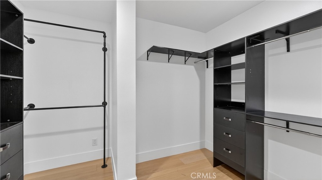 4404 Cogswell Road El Monte, CA 91732 - Photo 54 of 62 a view of walk in closet with empty racks
