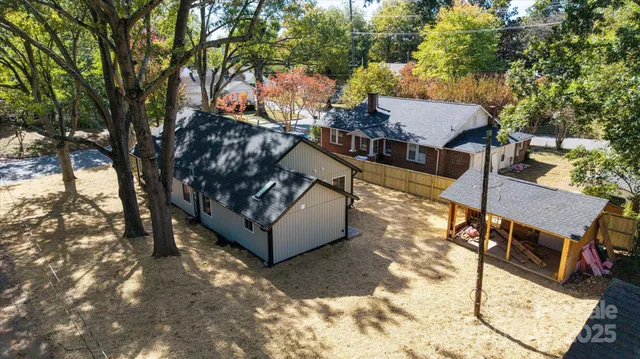 a view of kitchen with sink cabinet and refrigerator