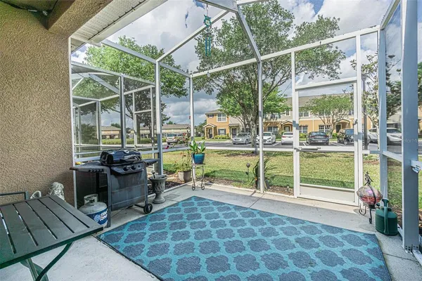 a view of balcony with yard