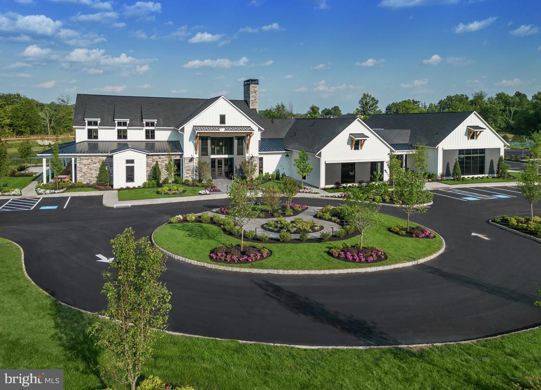 202 Gerry Way Ambler, PA 19002 - Photo 18 of 39 a front view of a house with a yard and lake view