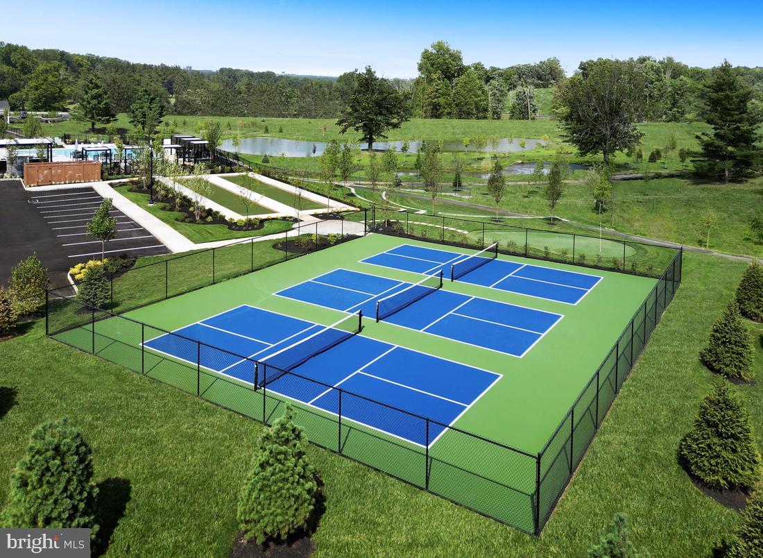 202 Gerry Way Ambler, PA 19002 - Photo 30 of 39 a view of a tennis ground with large trees