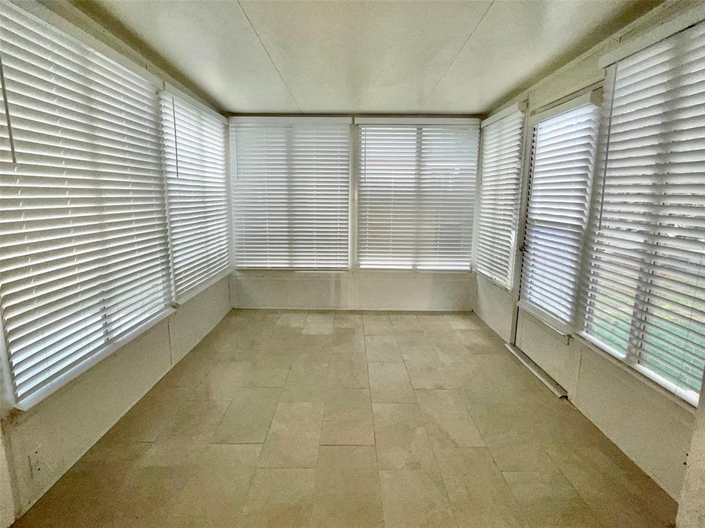 2852 Stillwell Court New Port Richey, FL 34655 - Photo 12 of 13 a view of an empty room with a window
